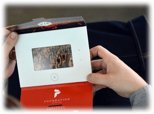 Guy Holding Interactive Pro Video Intorduction Card